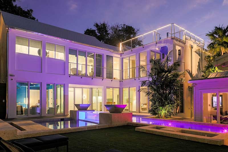 415 Grinnell Street residence in Old Town Key West, lit at dusk